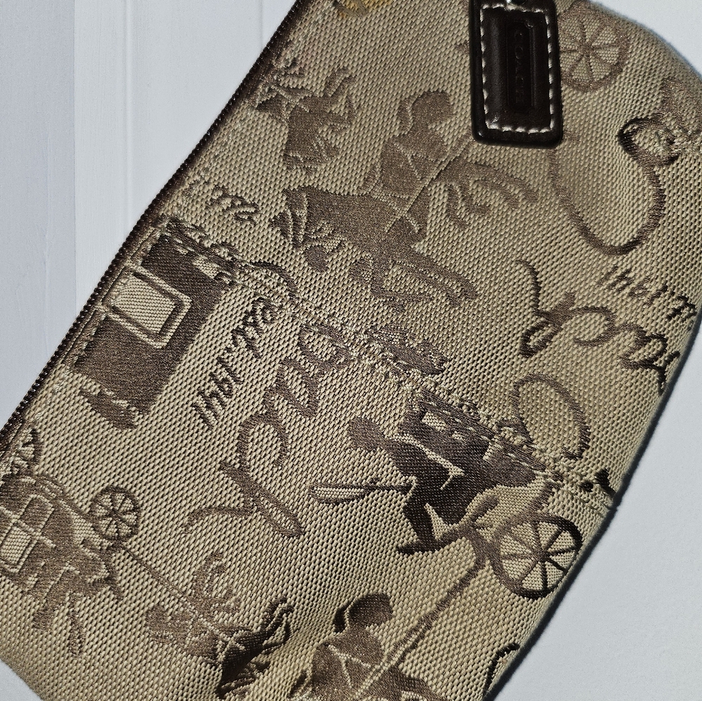 Coach brown canvas wristlet
